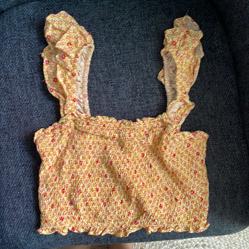 Smocked crop top with short ruffled sleeves
